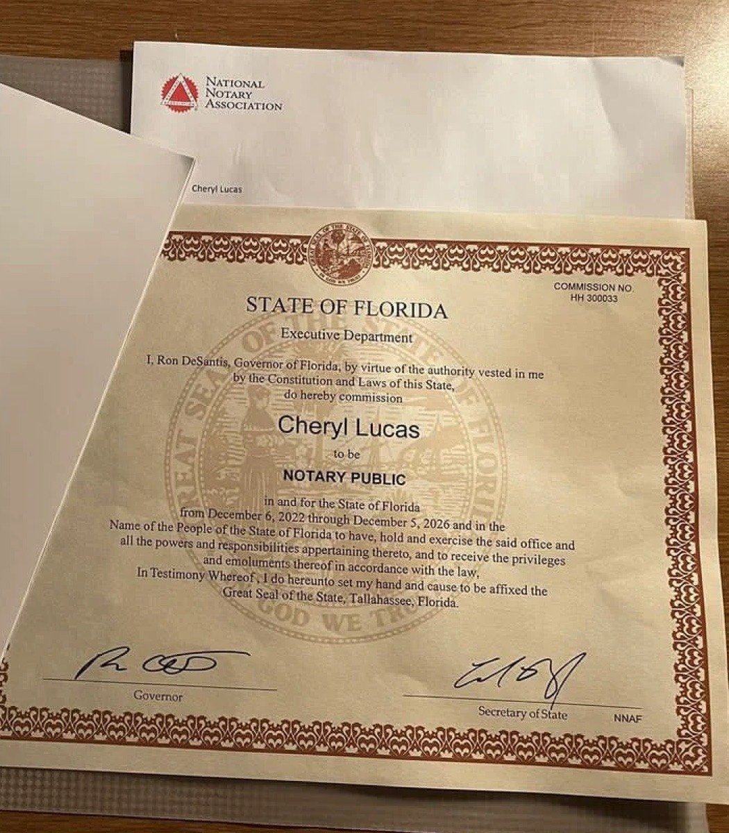 Cheryl Lucas notary public commission certificate issued by the State of Florida, on National Notary Association letterhead